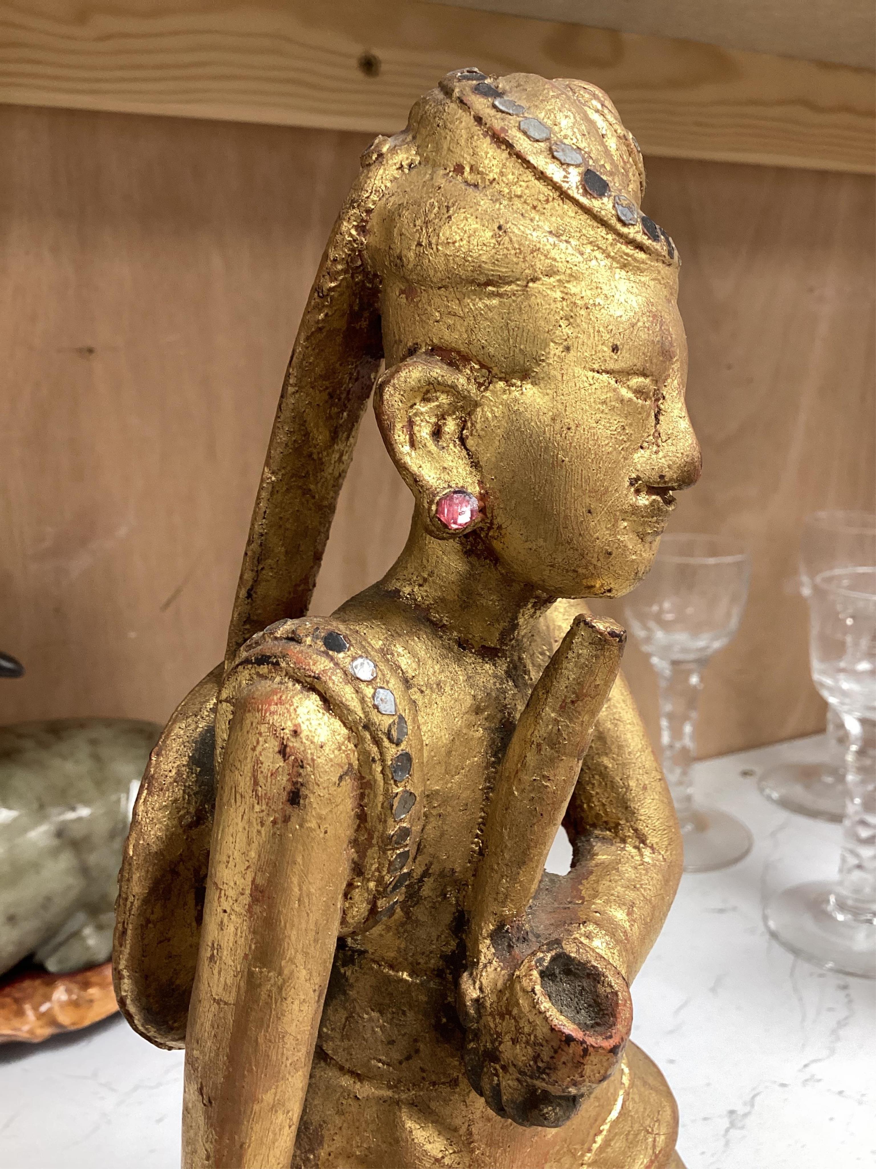 Two modern jade figures, together with a marble Buddha and a carved giltwood figure, largest 24cm wide